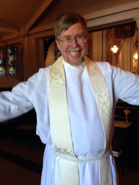 Minister John Perry gives Kiss of Peace on day he retires:  May 12, 2014