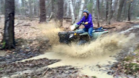 Emily frolics in the mud 4-2015