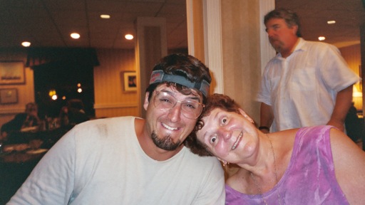 Owen mimics his Mom; grabs her eyeglasses, and grins. He took 35 years to study this look!