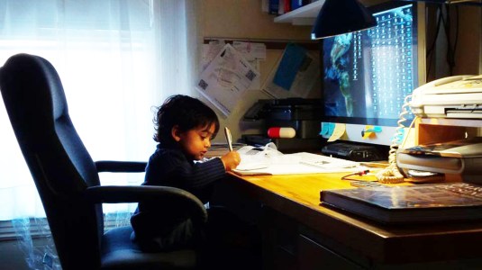 Huge desk: tiny poet 