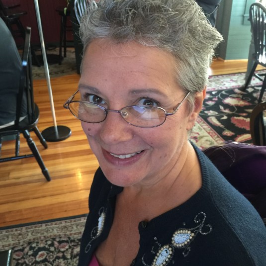 Christina Boucher designer using inDesign to highlight Mt Desert Island